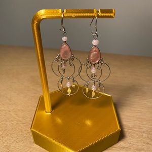 Intricate pink and silver drop earrings